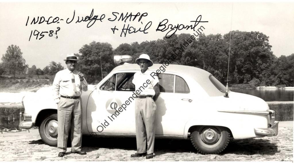 Judge Snapp and Hail Bryant pictured beside the official Civil Defense car